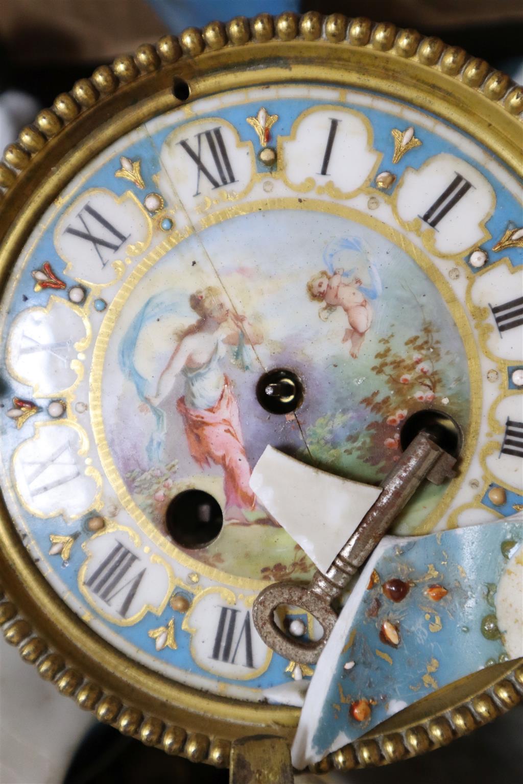 A French porcelain and ormolu clock (for restoration)